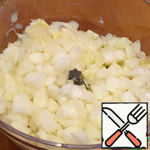 Dice the onion using a food processor or manually. Fry the onion until transparent.