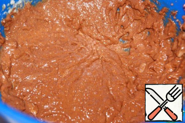 Mix the yolk mixture with chocolate and almond flour.
