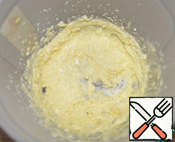 Margarine is slightly melted and whipped into a cream with powdered sugar.