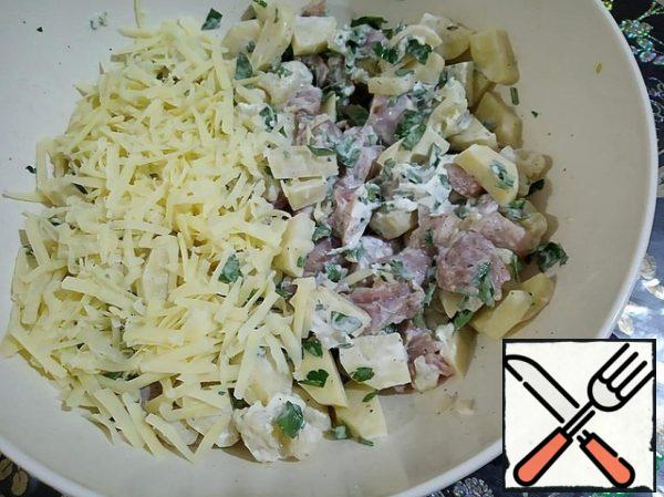Add the grated cheese on a large grater and mix again.