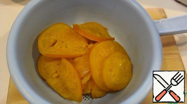 Put the finished oranges in a colander and cool.