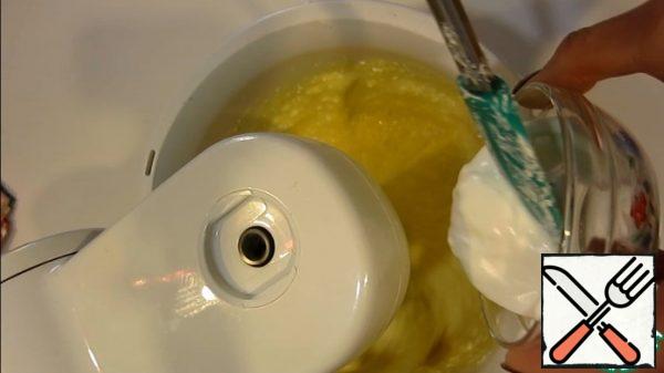 Add eggs and sour cream.