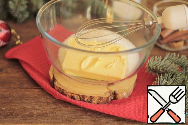 Softened butter (250 g) whisk with sugar until creamy.