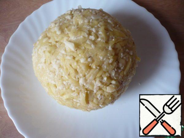 Ready-made potato ball with meat filling.