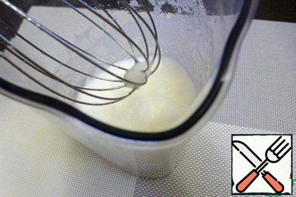 Whisk the whites with a mixer with a whisk attachment to soft peaks.