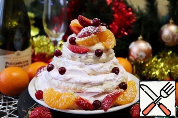 We collect Pavlov's dessert in the form of a pyramid - Christmas tree, smearing each layer with whipped cream. Put pieces of fruit and berries on top. When serving, sprinkle with powdered sugar and baking powder.
Dessert does not tolerate storage! Ready and immediately on the table! Otherwise, the meringue will get wet from the cream and berries.
Enjoy your meal!