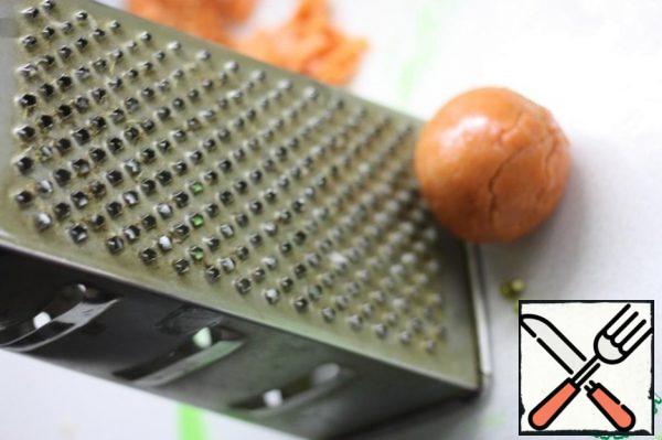 To make it look more like tangerine, grate it on a fine grater. And I inserted the "balls" from real tangerines.