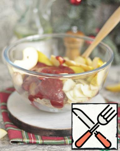In a large bowl, mix the Turkey , apples, onions, and ketchup.