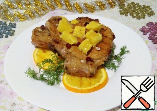 Serve the meat on orange rings, and arrange the pieces on top of the meat. Boil the remaining marinade and pour over the meat. Bon Appetit!
