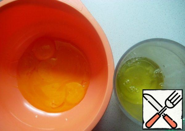 Separate the whites from the yolks in different dishes.