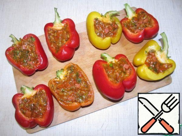 Stuff the peppers with a vegetable mixture.