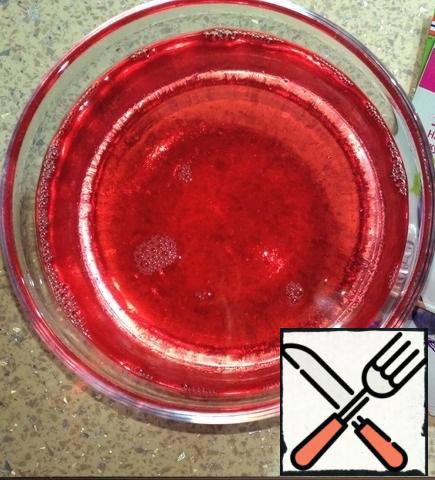 Boil 300 ml of water , dissolve the jelly in it , mix well, let it cool down a little.