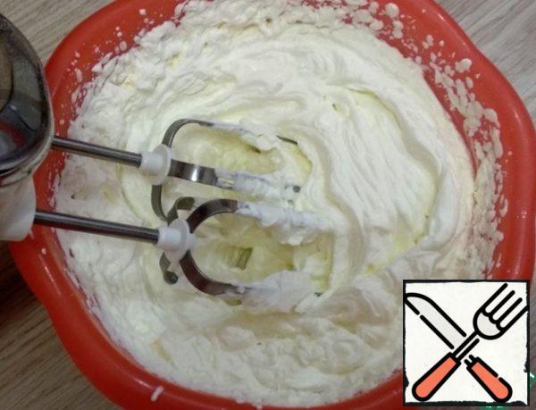 Next, whisk the cream to steady peaks.