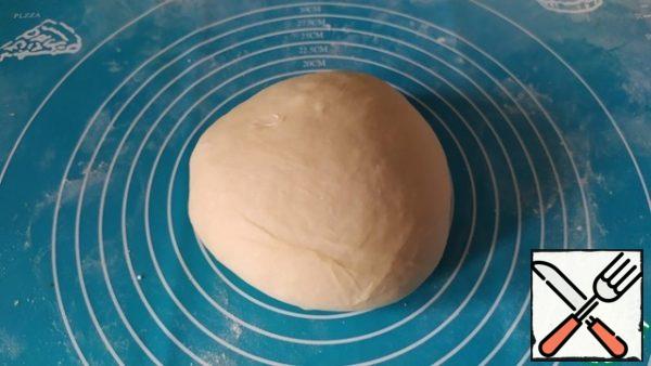 Dissolve the salt in water and stir the egg. Gradually introduce flour and knead a soft, but not sticky dough. Wrap in cling film and leave for 20-30 minutes.