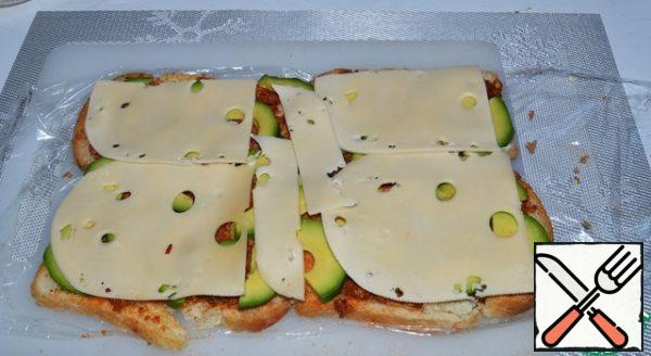 Top with slices of cheese.