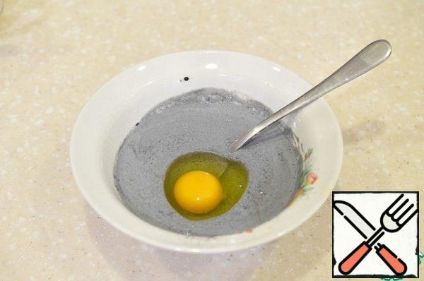 Add salt, sugar, and beat in the egg.