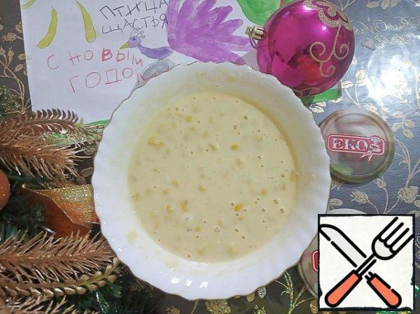 In a bowl with flour and eggs, add the milk and corn and mix thoroughly.