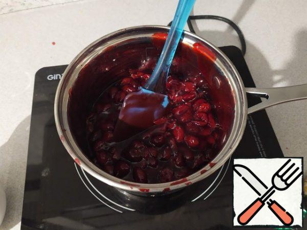 To make cherry compote, mix the cherries and sugar in a saucepan. Bring to a boil. Pour in the starch diluted in water and cook until thickened. Remove from the stove and allow to cool completely, tightly covering the mass with cling film.