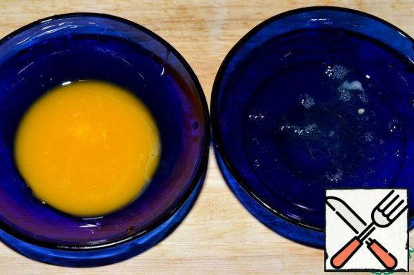 Divide the egg into yolks and whites. Lightly whisk with a fork.