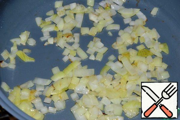 Onion finely cut and fry in vegetable oil.