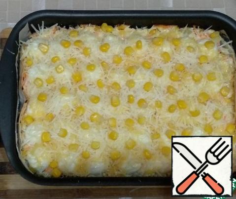 Spread some corn kernels on top. And again send in the oven for 15 minutes.