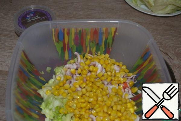 Drain the water from the jar, add the corn to the rest of the ingredients and mix.