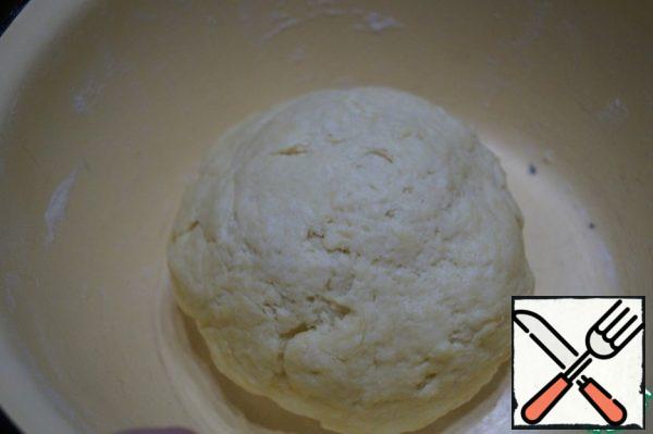 Then add the sifted flour and knead a soft, elastic dough. Leave it to rest for 15 minutes.