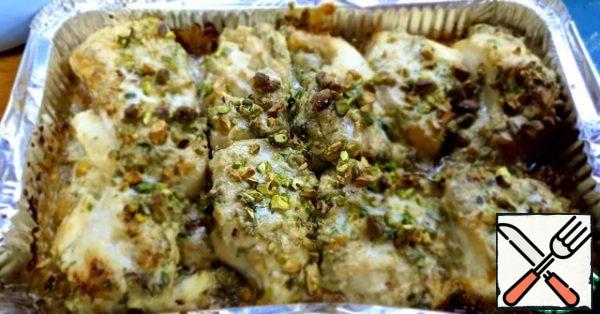 Sprinkle all the chopped pistachios on top. Bake at 180 degrees for 35 minutes. Or until the fish is ready.