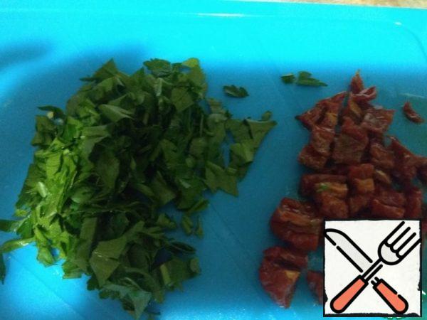 I cut parsley and dried tomatoes.