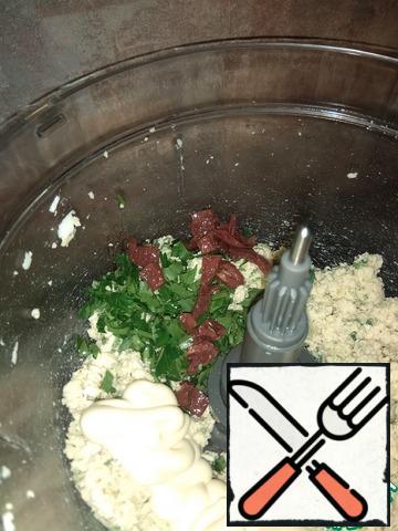 I added parsley, sun-dried tomatoes and mayonnaise to the bowl of the combine.