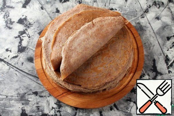 Transfer the finished pancakes to a plate and cool.
From this amount of dough , 12 pancakes with a diameter of 18 cm are obtained .