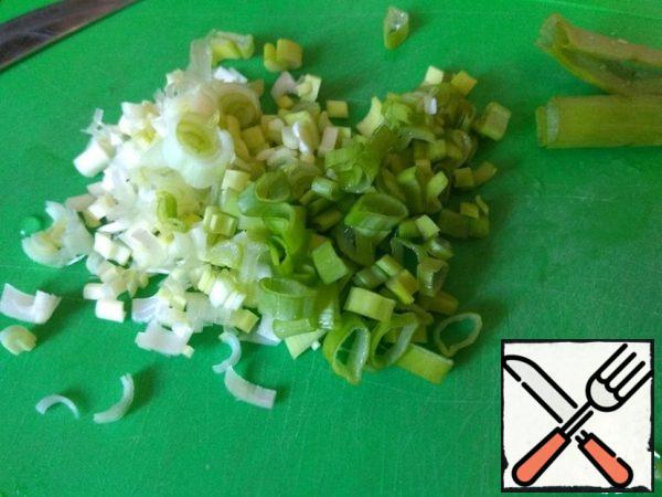 Finely chopped green onions.