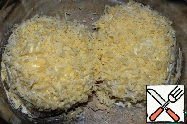 Sprinkle everything with grated cheese.