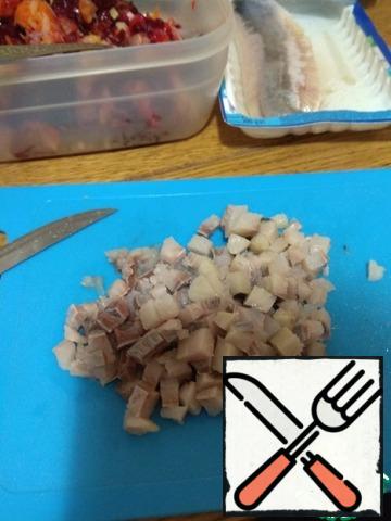Half of the herring was diced.