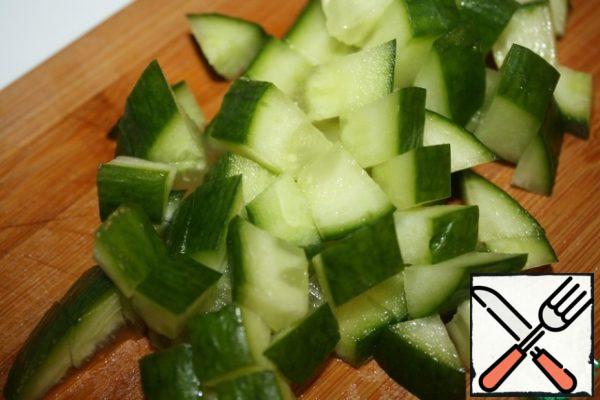 Cucumber is also cut into a large cube.