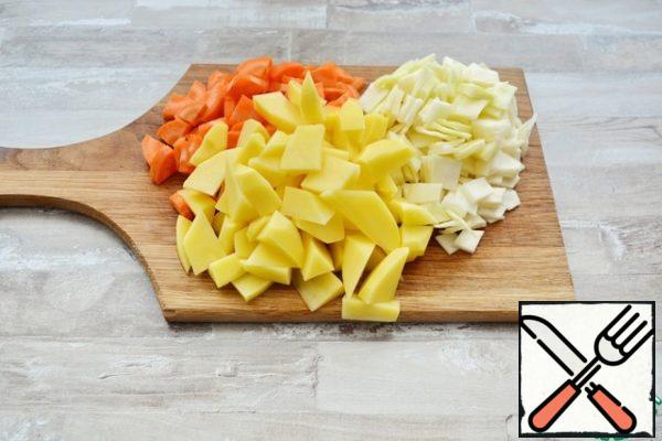 Cut the vegetables into cubes or slices.