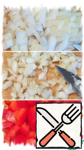 Finely chop the onion, chop the garlic, and dice the pepper.