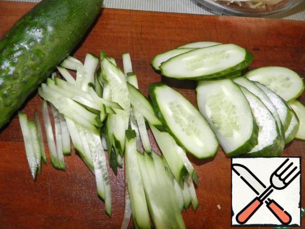 Slice the cucumbers.