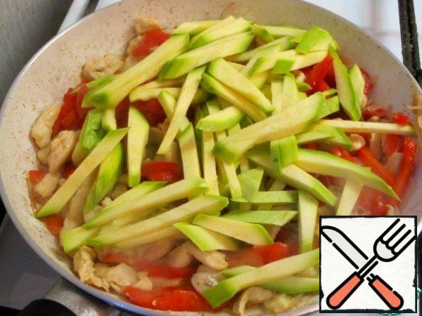 Add the sliced zucchini.