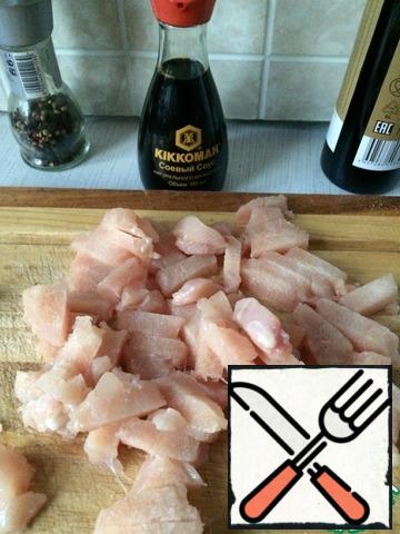 Wash the fillet and cut into strips.