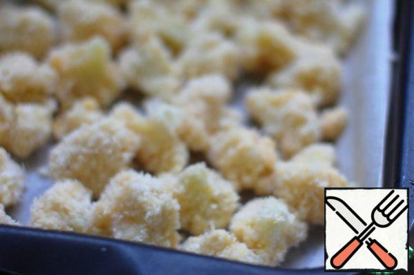 Cut the cauliflower into small inflorescences. Dip the inflorescences in flour, then in egg, then in crumbs. Place on a baking sheet lined with parchment paper. Bake for 15-20 minutes or until lightly crispy.
