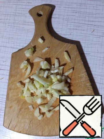 Chop the garlic clove.