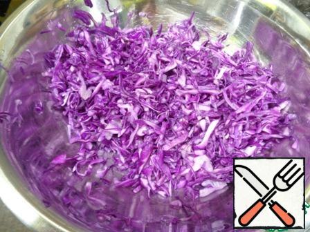 Thinly chop the cabbage, add salt, and RUB it with your hands a little.