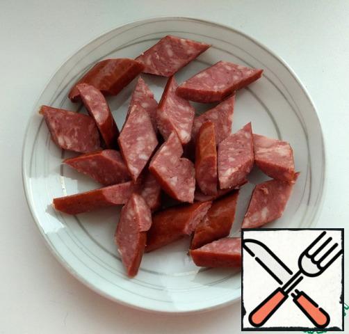 Cut the sausages.
