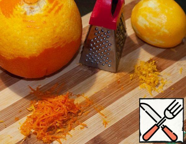 Remove the zest from the orange and lemon halves.