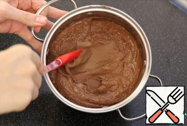 When the chocolate-custard base cools, it will become much denser.