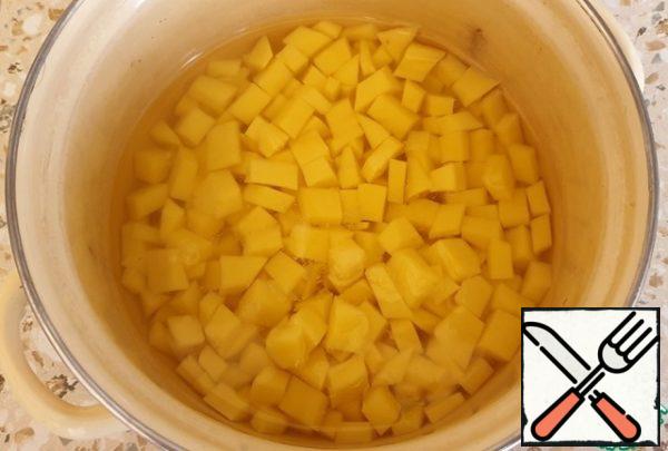 Peel and finely chop the potatoes.