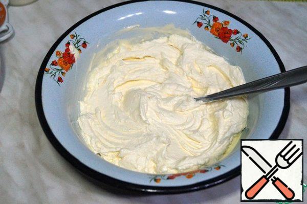 Soften the cream margarine with cottage cheese into a homogeneous mass.
