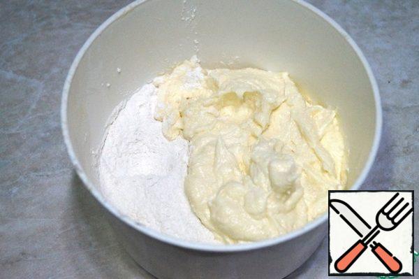 Add the flour sifted with baking powder. Knead a soft dough that does not stick to your hands.