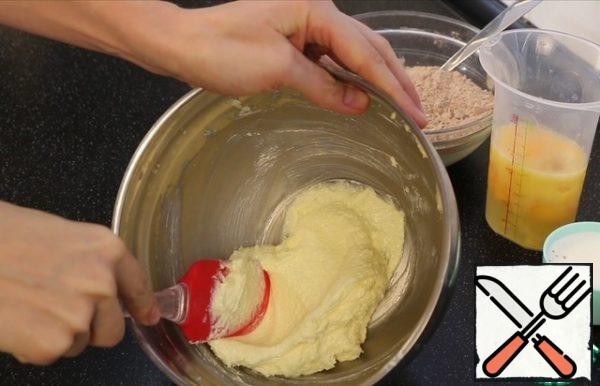 Beat softened butter with sugar until white.